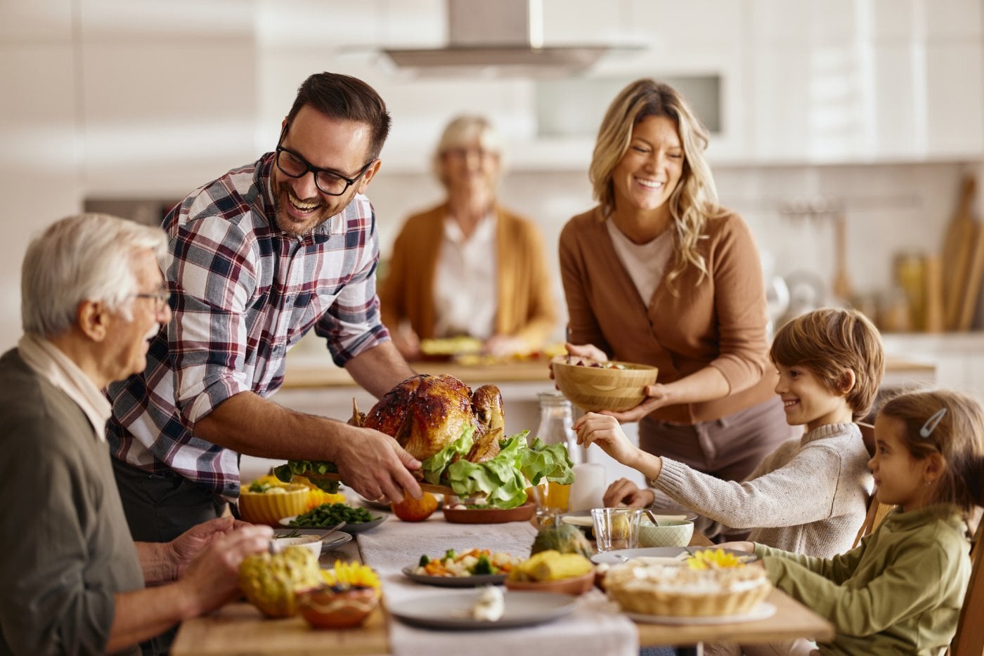 A family gathered around the Thanksgiving table